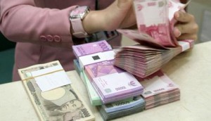 thumb_Uang_Rupiah_di_Bank_04_SY