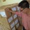 Koordinator Divisi Logistik dan Keuangan KPU Padang, Mahyudin memperlihatkan logistik surat suara Pilpres 2014.