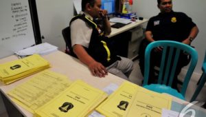 Para Ahli Dibalik Identifikasi Jenazah Korban AirAsia
