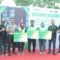 Direktur Lalu Lintas Polda Sumatera Barat Kombes Pol Singgamata (ketiga dari kiri) mendampingi SVP Public Policy and Government Relations GO-JEK Malikulkusno Utomo (paling kanan) dan Asisten Deputi Direktur Bidang Perluasan dan Kepersertaan BPJS Ketenagakerjaan Hadi Purnomo (kedua dari kanan) ketika secara simbolis menyerahkan kartu peserta BPJS Ketenagakerjaan kepada tiga mitra pengemudi GO-JEK.