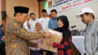 Pemko Bukittinggi Bagikan Sembako Bagi 1540 KK Kurang Mampu