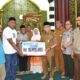 pemko-padang-dan-baznas-salurkan-rp215-juta-untuk-korban-kebakaran-pemancungan