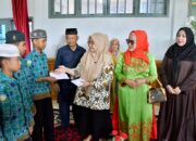 TP PKK Agam Berbagi, Anak Yatim Tersenyum