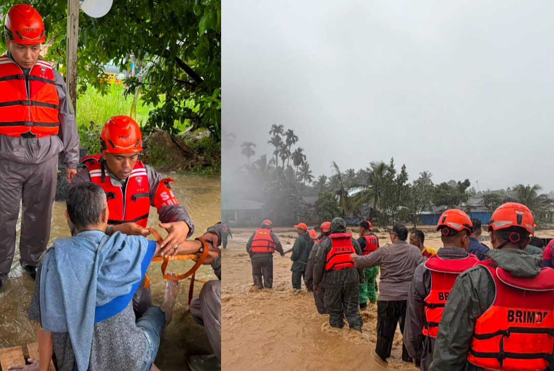 tim-sar-satbrimob-polda-sumbar-evakuasi-korban-banjir-di-kota-padang