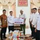bupati-agam-salurkan-santunan-untuk-10-korban-petir-dan-longsor
